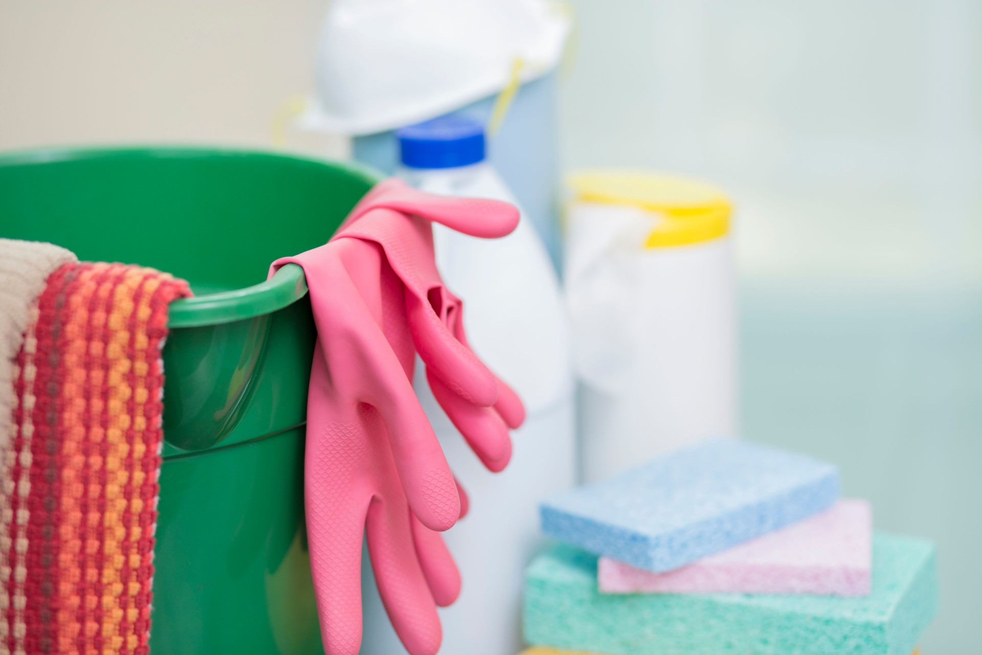 Gloves, sponges and disinfectant to clean office and desk surface